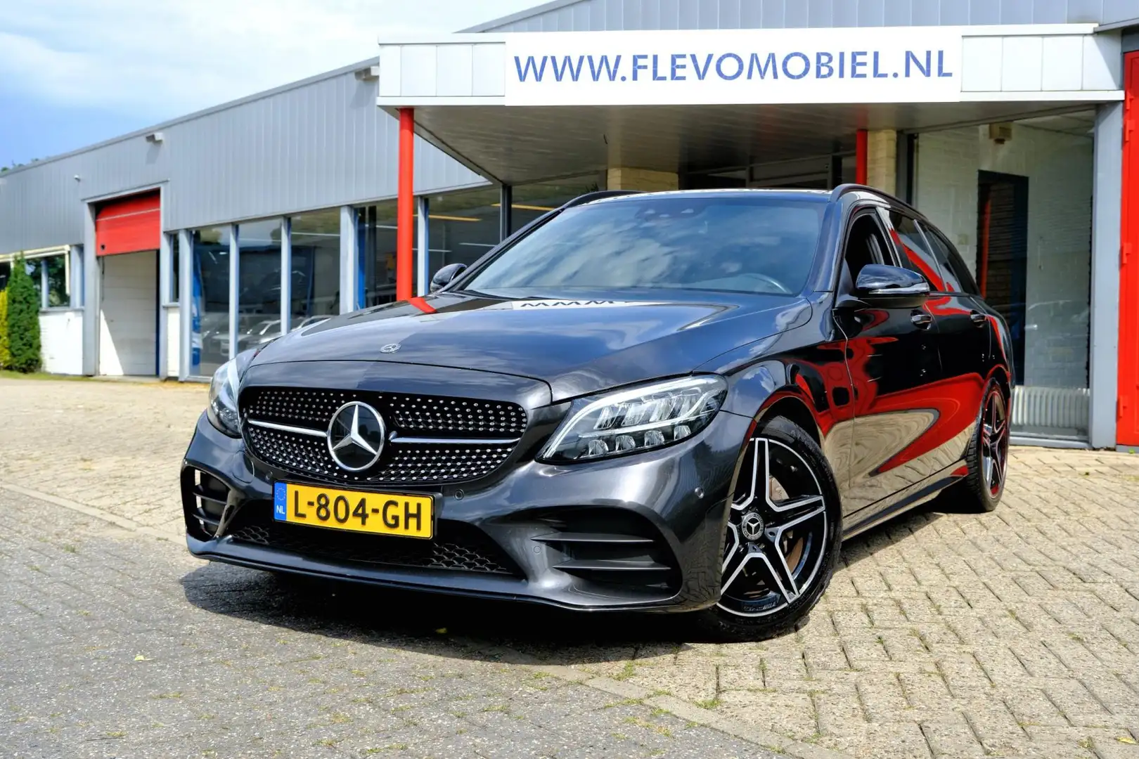 Mercedes-Benz C 180 Estate AMG Aut. Pano|1e Eig|Leder|Sportstoelen|LED Gris - 1