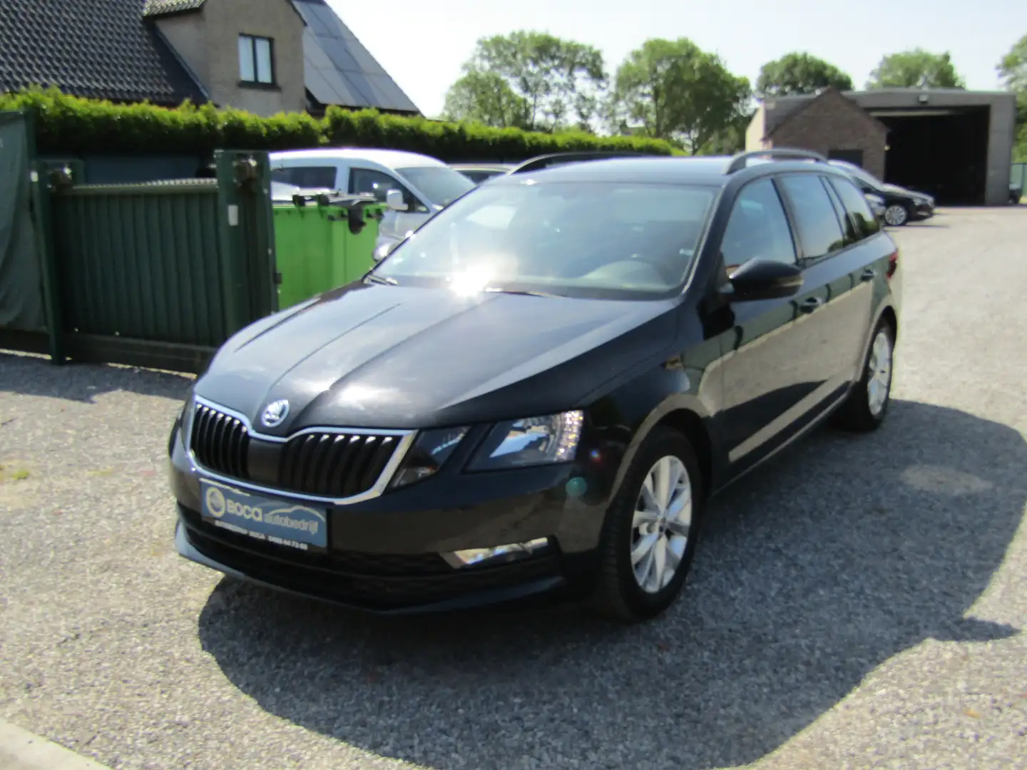 Skoda Octavia SW 1.6 CR TDi Ambition DSG Zwart - 1