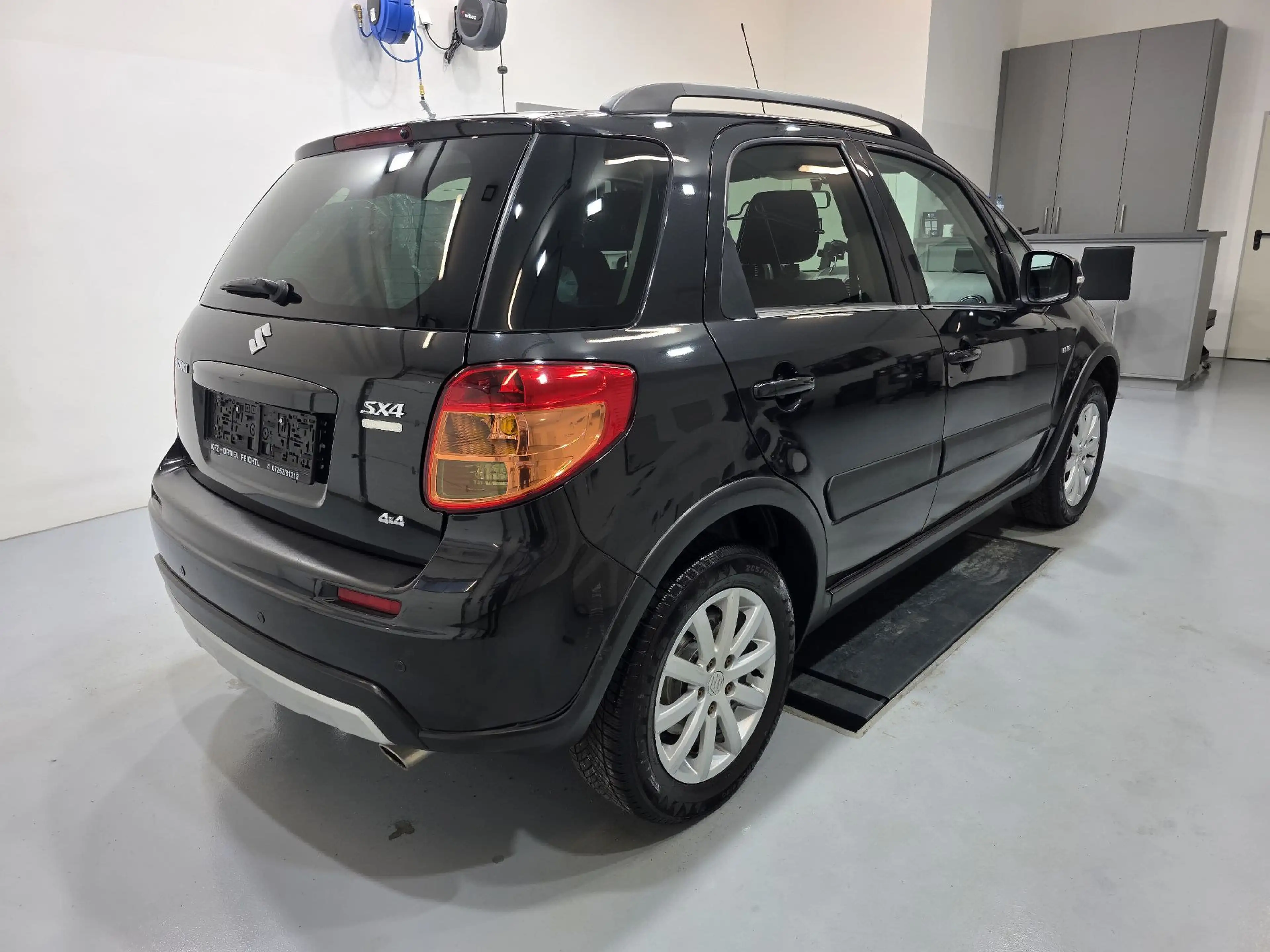 Suzuki SX4 Navigator GLX 4WD 2,0 — photo 5