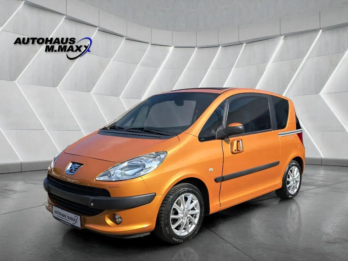 Peugeot 1007 Premium Automatik el.Türen PDC Pano Sitzh. Orange - 1