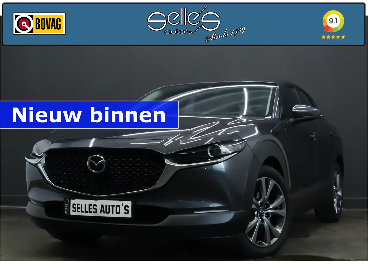 Mazda CX-30 2.0 e-SkyActiv-X M Hybrid Luxury | Trekhaak | Bose Grijs - 1