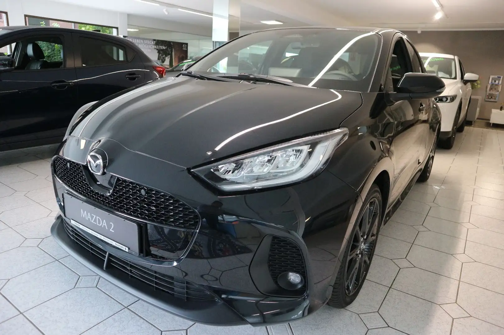 Mazda 2 Hybrid 1.5 VVT-i 116 e-CVT  HOMURA Schwarz - 1