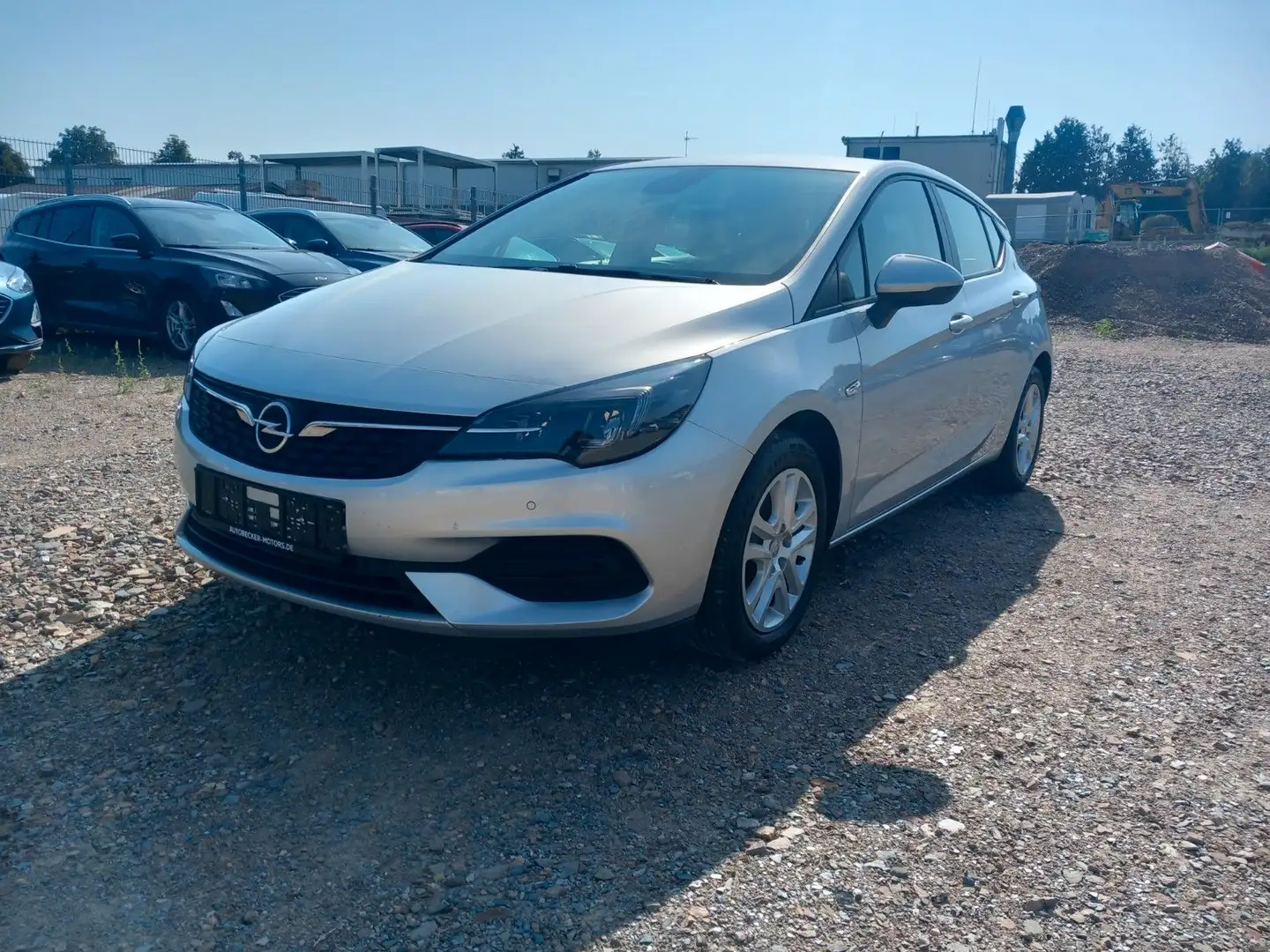 Opel Astra K Lim. 5-trg. Lim. Navi, Shz ab 89€ mtl. Argento - 1