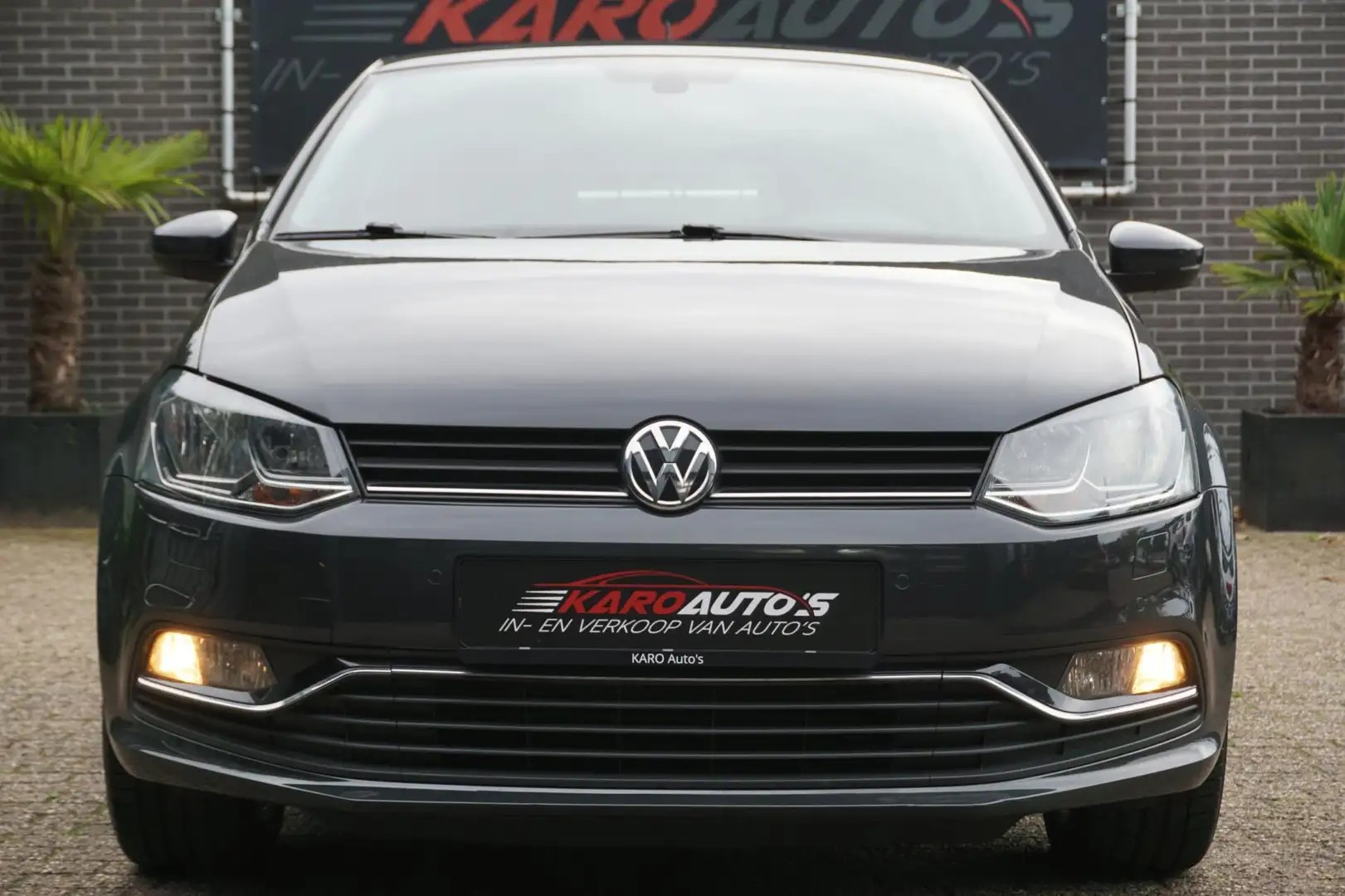 Volkswagen Polo 1.2 TSI Highl Cruise Clima Elek R Stoelv Pdc Gris - 2