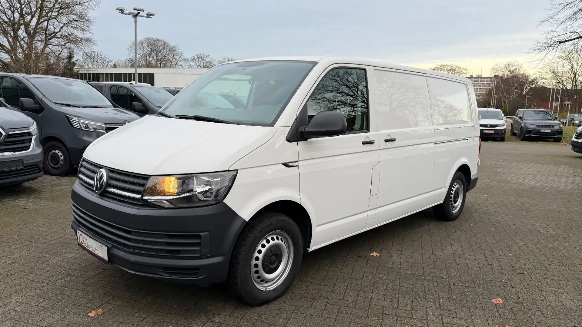 Volkswagen T6 Transporter T6 TRANSPORTER LANG STANDHZ/KLIMA/AHK/TÜV NEU Weiß - 1