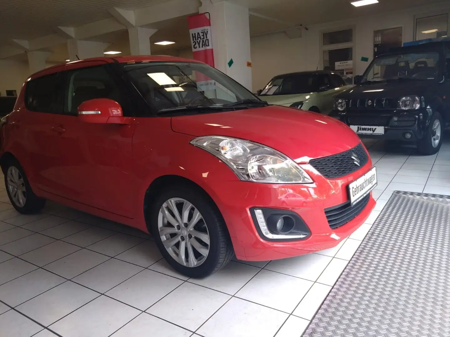 Suzuki Swift 1.2 Comfort Rouge - 2