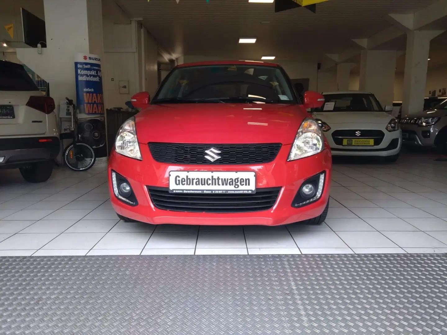 Suzuki Swift 1.2 Comfort Rouge - 1