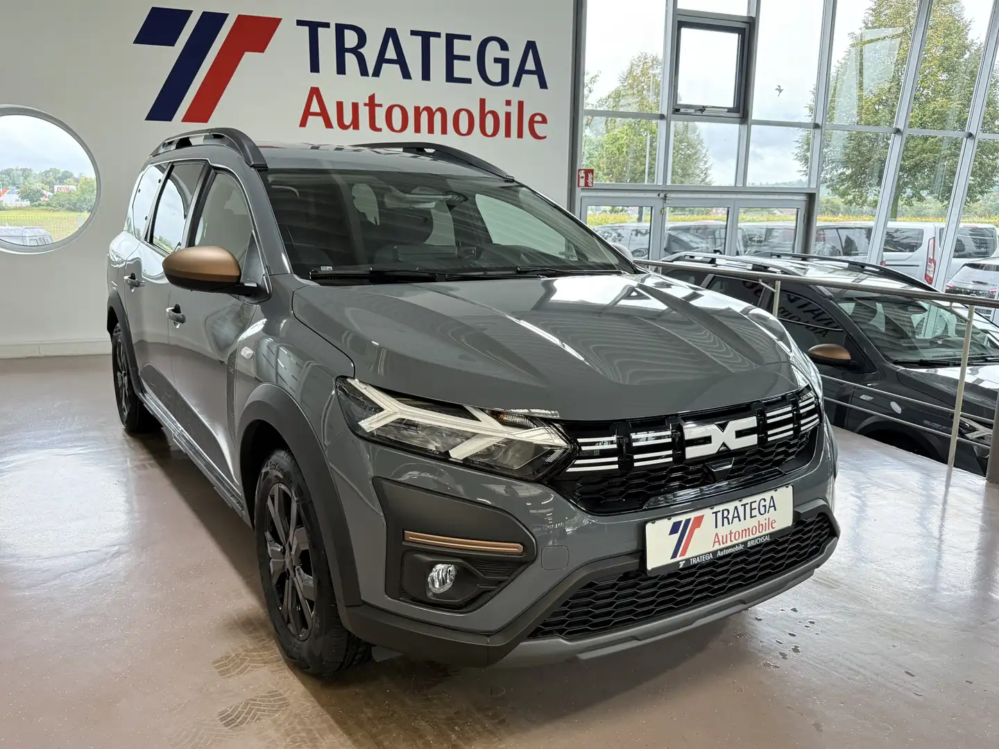 Dacia Jogger Hybrid 140 Autom Extreme 7-Sitzer Navi SH Grijs - 1