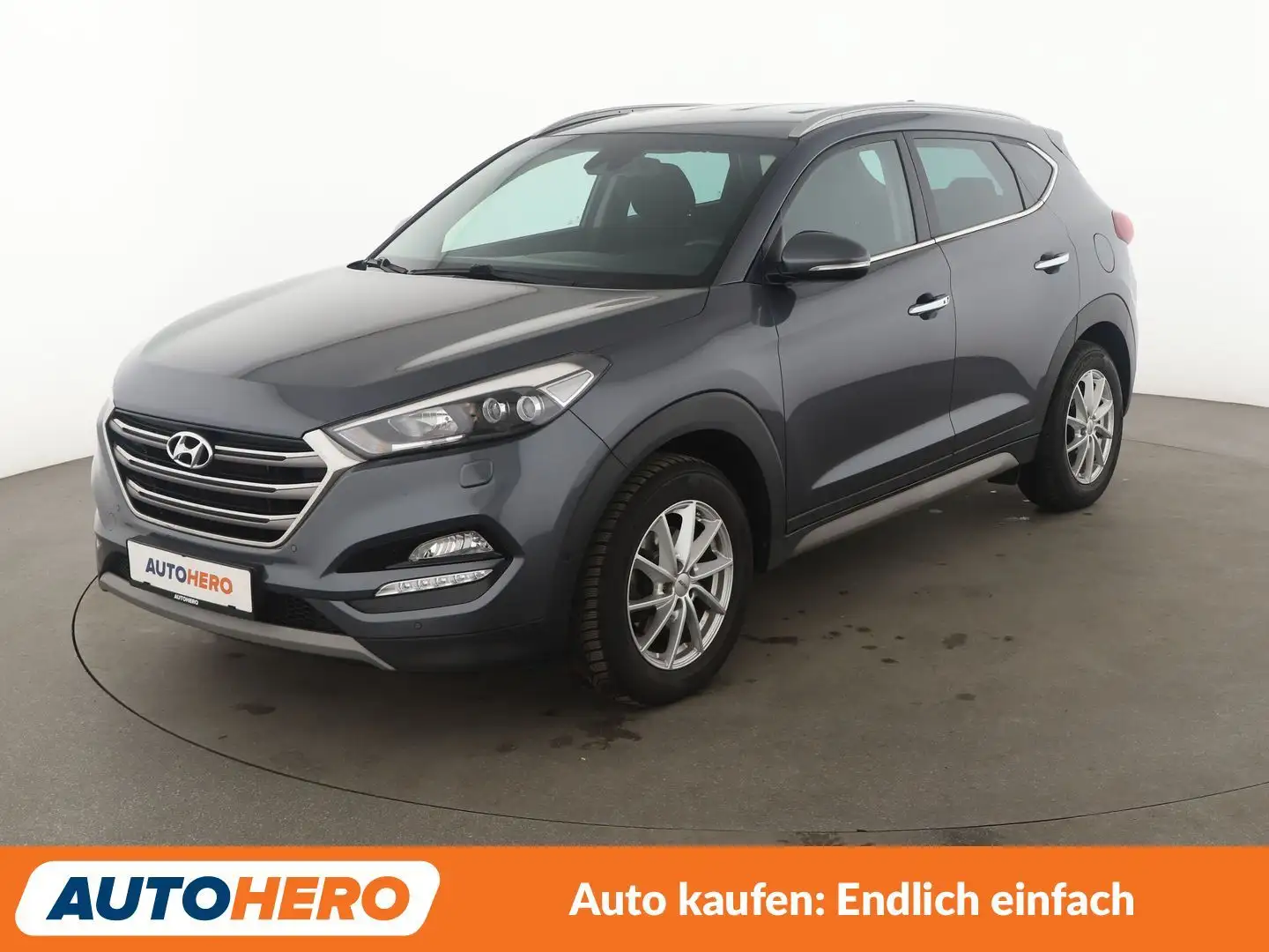 Hyundai TUCSON 1.6 TGDI Premium 4WD Aut*NAVI*TEMPO*CAM*PDC*SHZ* Grau - 1