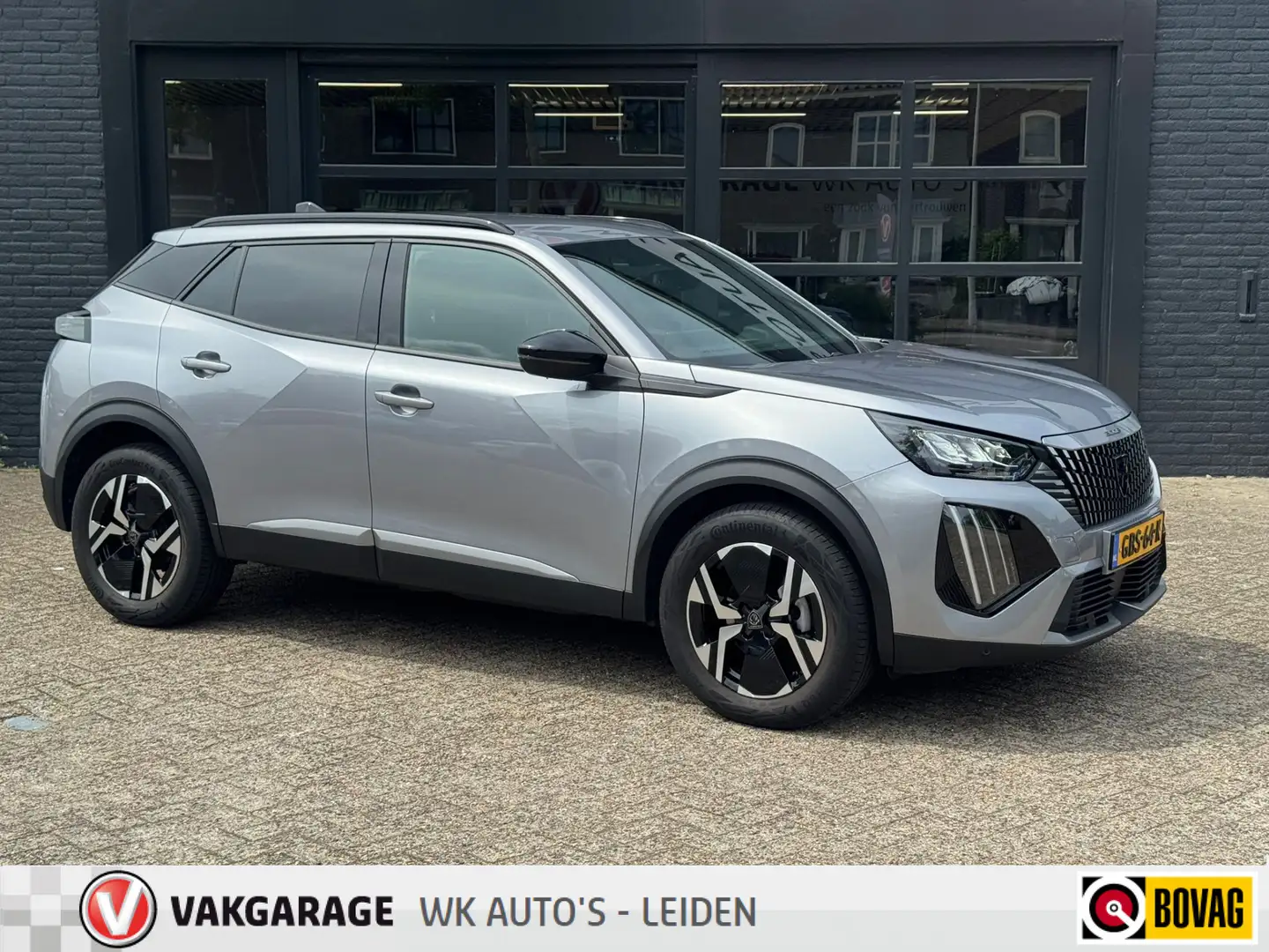 Peugeot 2008 1.2 PureTech 100 Allure - Zwarte hemel - Wireless Grau - 1