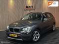 BMW X1 xDrive20i 184 Edition 2eEIGN NAP LEDER XENON TREKH Grijs - thumbnail 1