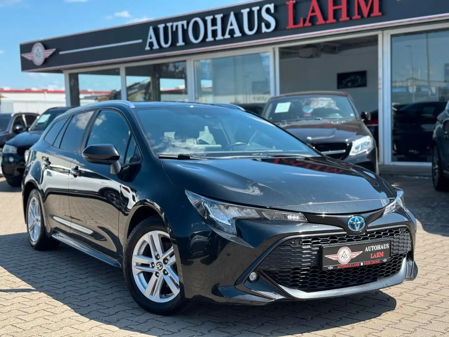 Toyota Corolla Touring Sports Hybrid Business Edition Noir - 1