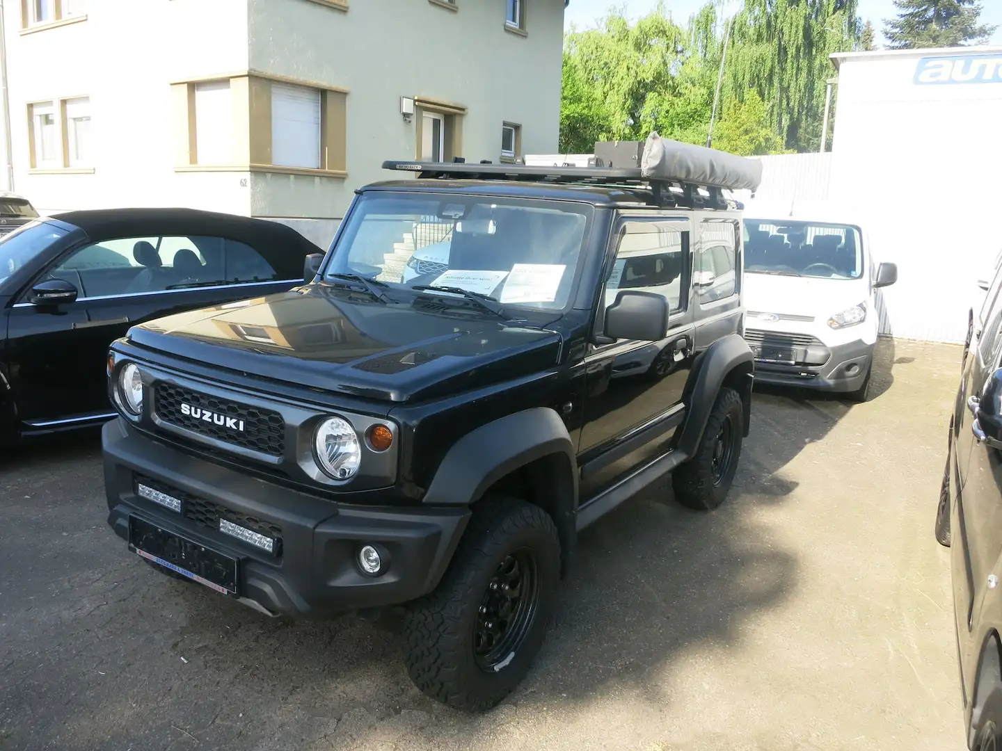Suzuki Jimny Comfort 4x4,Automatik,voller Extras,4S. Schwarz - 2