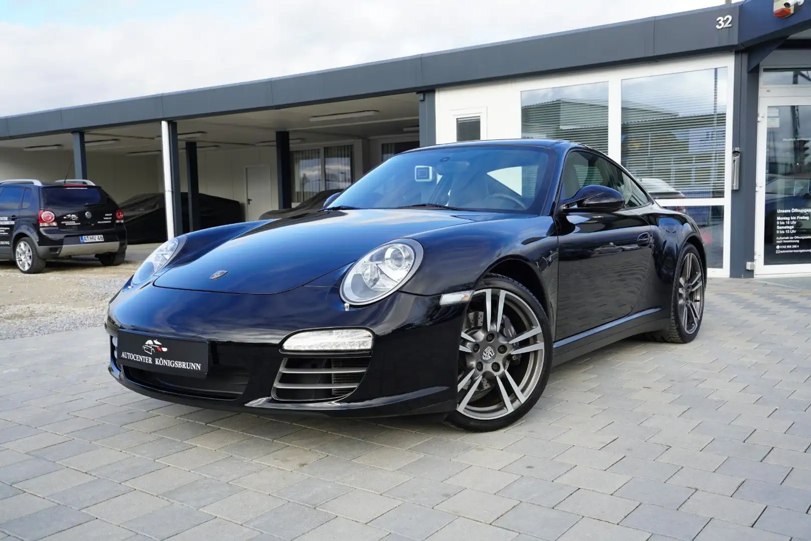 Porsche 911 997.2 *PDK*Leder*Sportabgas*Navi*SHD*Scheckheft* Schwarz - 1
