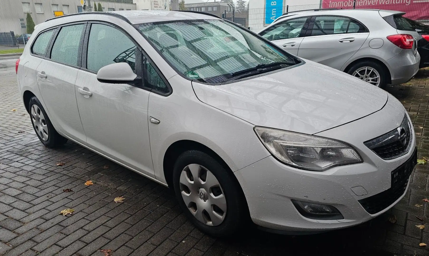 Opel Astra J Sports Tourer Selection Weiß - 1