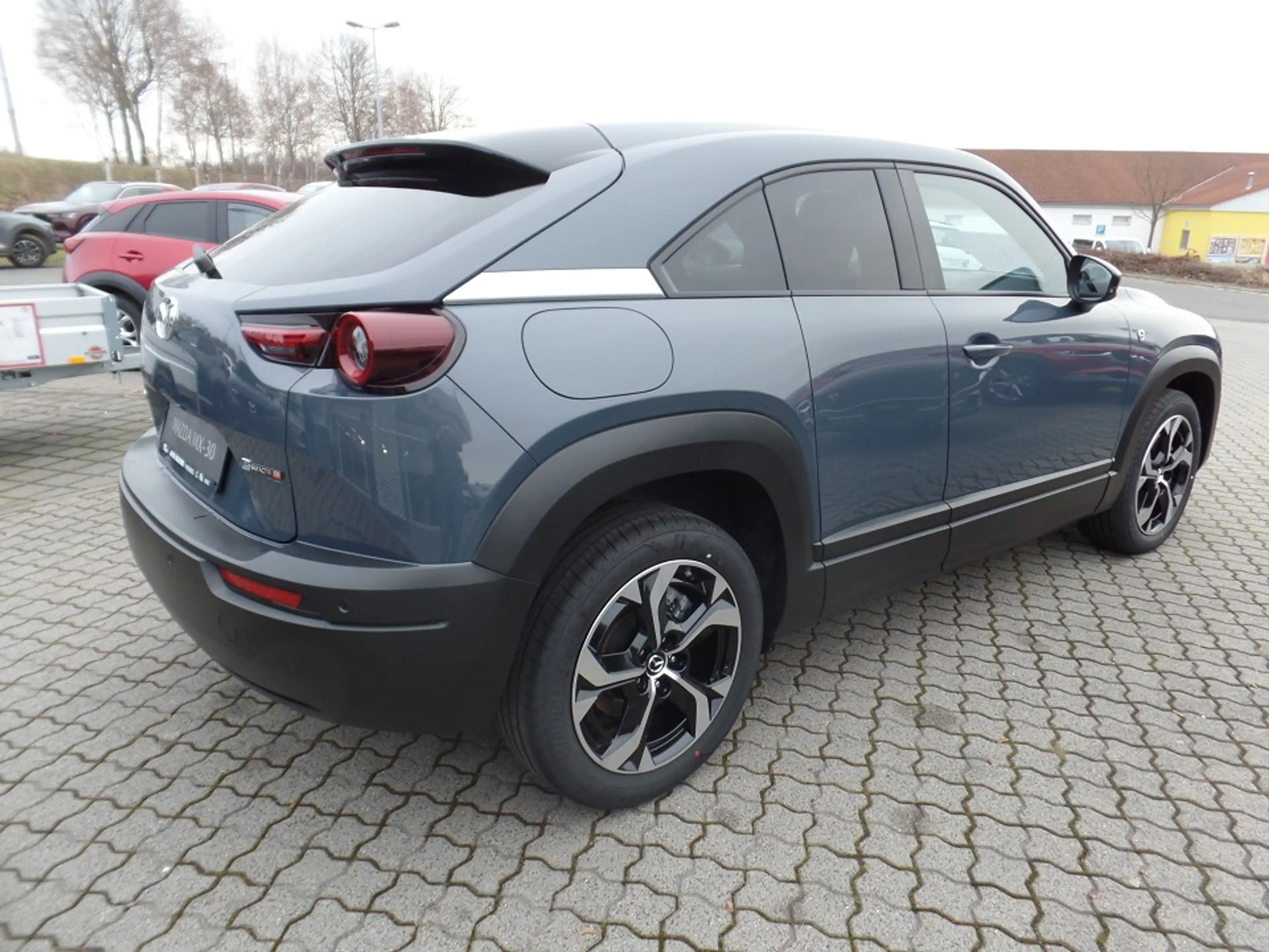 Mazda MX-30 e-SKYACTIV R-EV 170ps T AT Exclusive-Line — photo 11