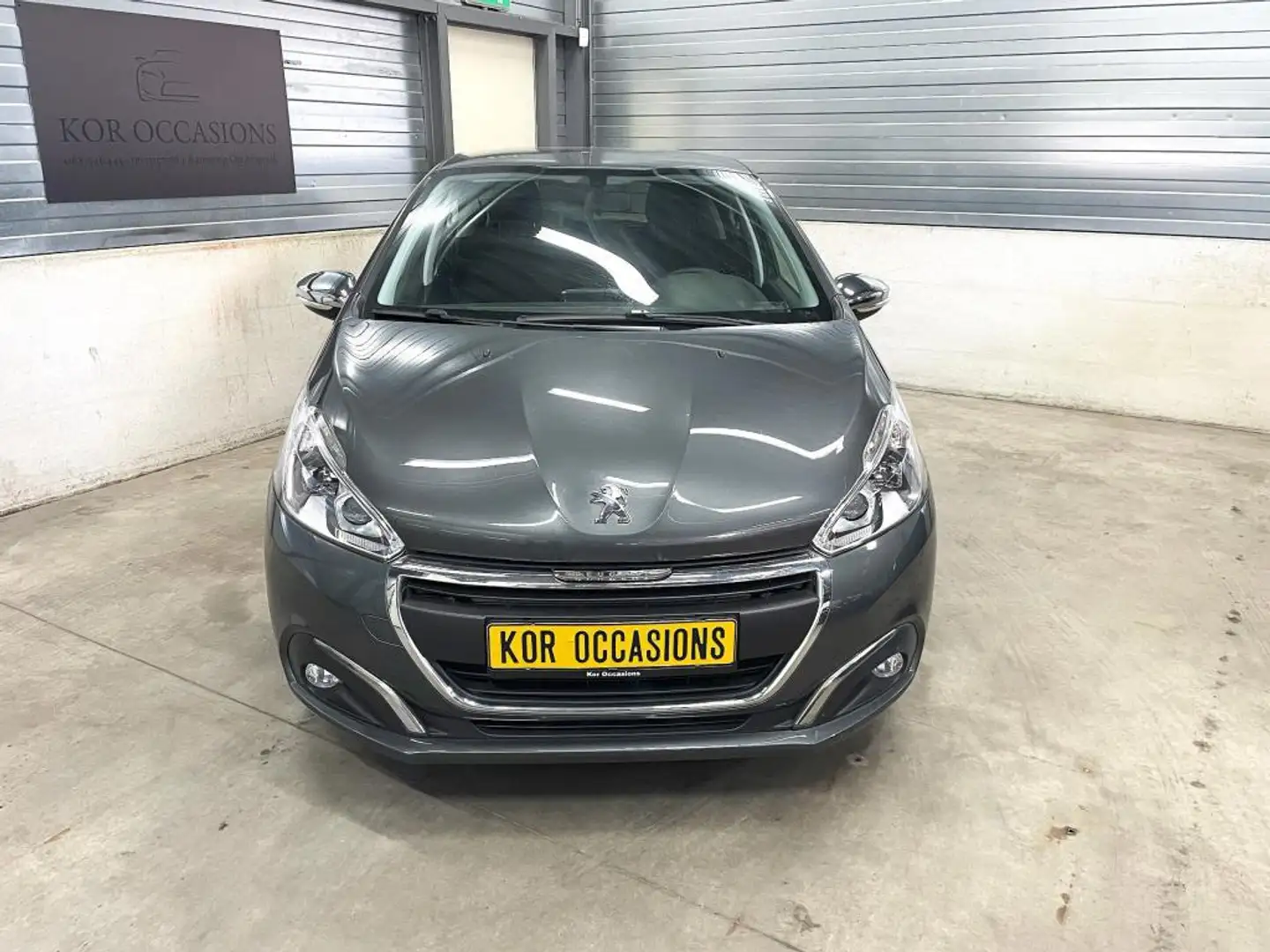 Peugeot 208 1.2 PureTech Allure 1ste eigenaar NAVI sport Grijs - 2