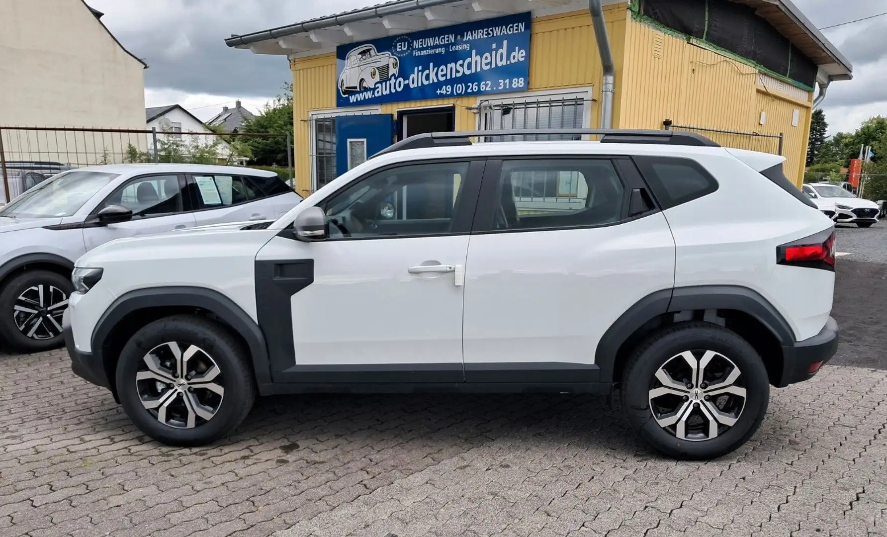 Dacia Duster III TCe130 4x4 Expression+SHZ+PDC-Kam+ Weiß - 2