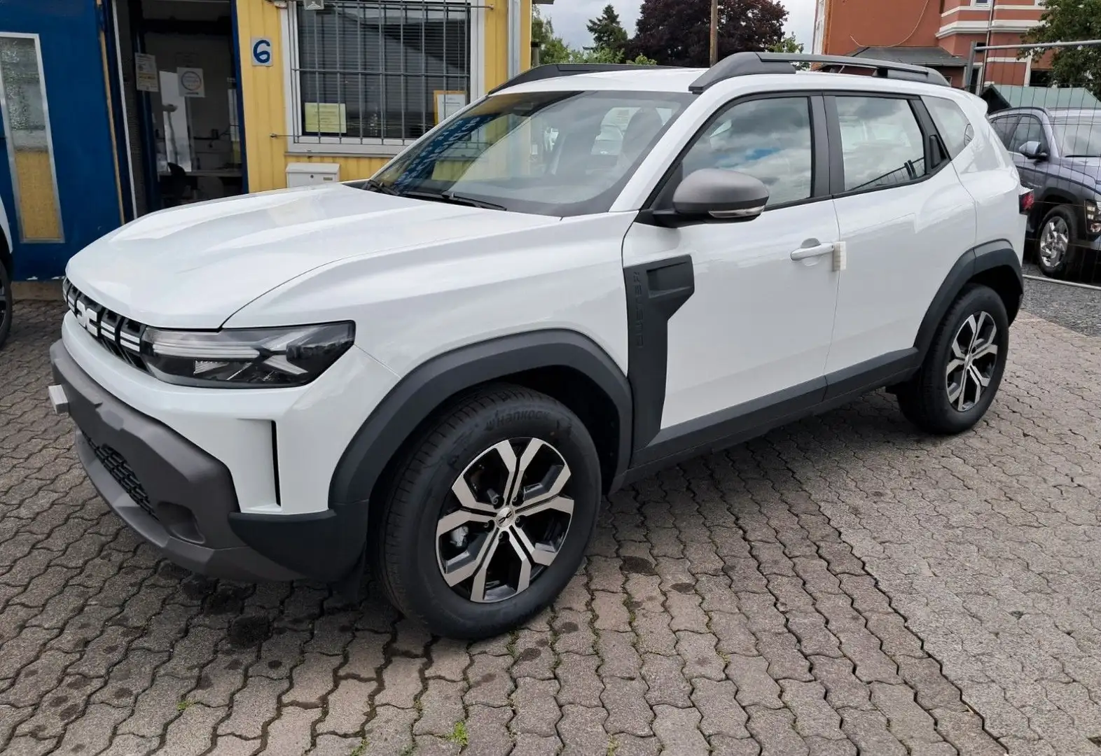 Dacia Duster III TCe130 4x4 Expression+SHZ+PDC-Kam+ Weiß - 1