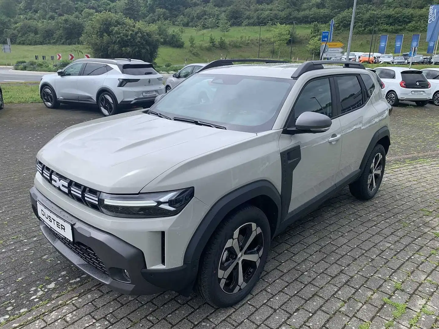 Dacia Duster 3 Journey MH TCe130 Navi Klima SHZ PDC+Kamera 360° Beige - 1