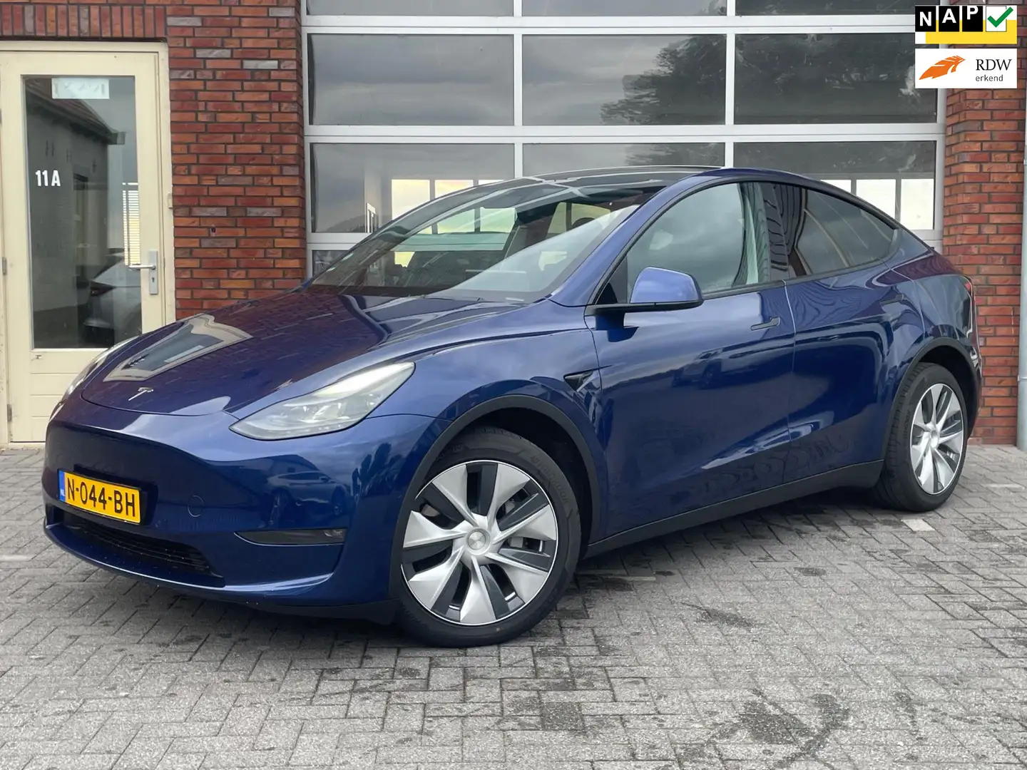 Tesla Model Y Long Range AWD 75 kWh | SOH 91% | Trekhaak | Autop Blau - 1