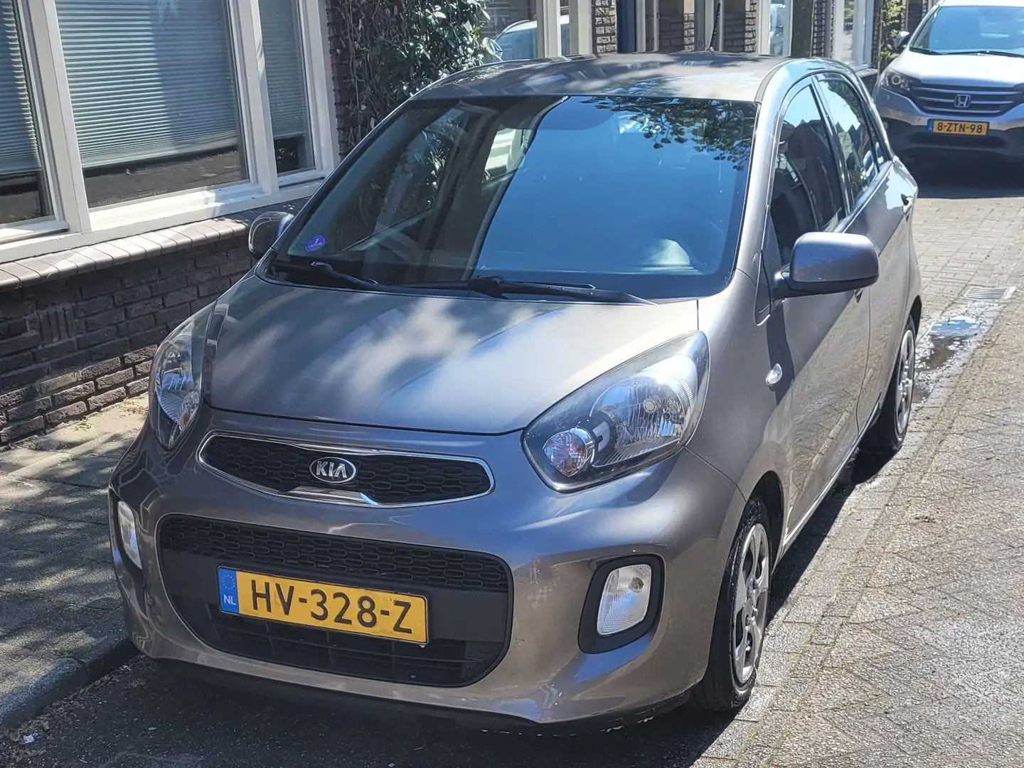 Kia Picanto 1.0 CVVT ComfortLine Grijs - 1