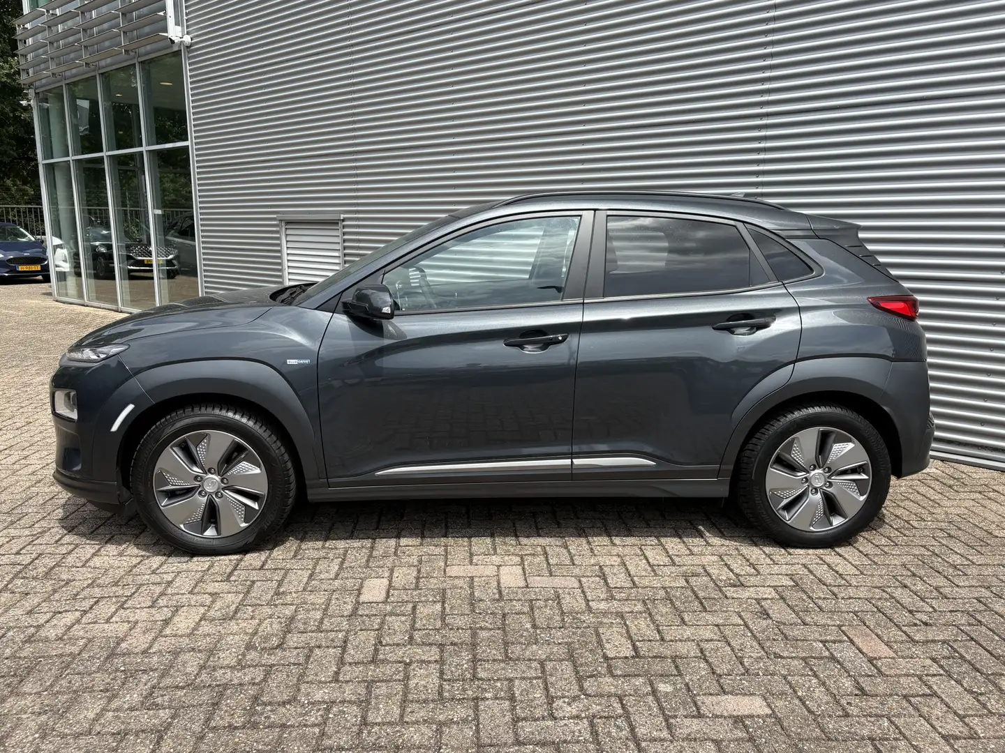 Hyundai KONA EV Fashion 64 kWh 3-FASE LADEN Design Pack | Navig Gris - 2