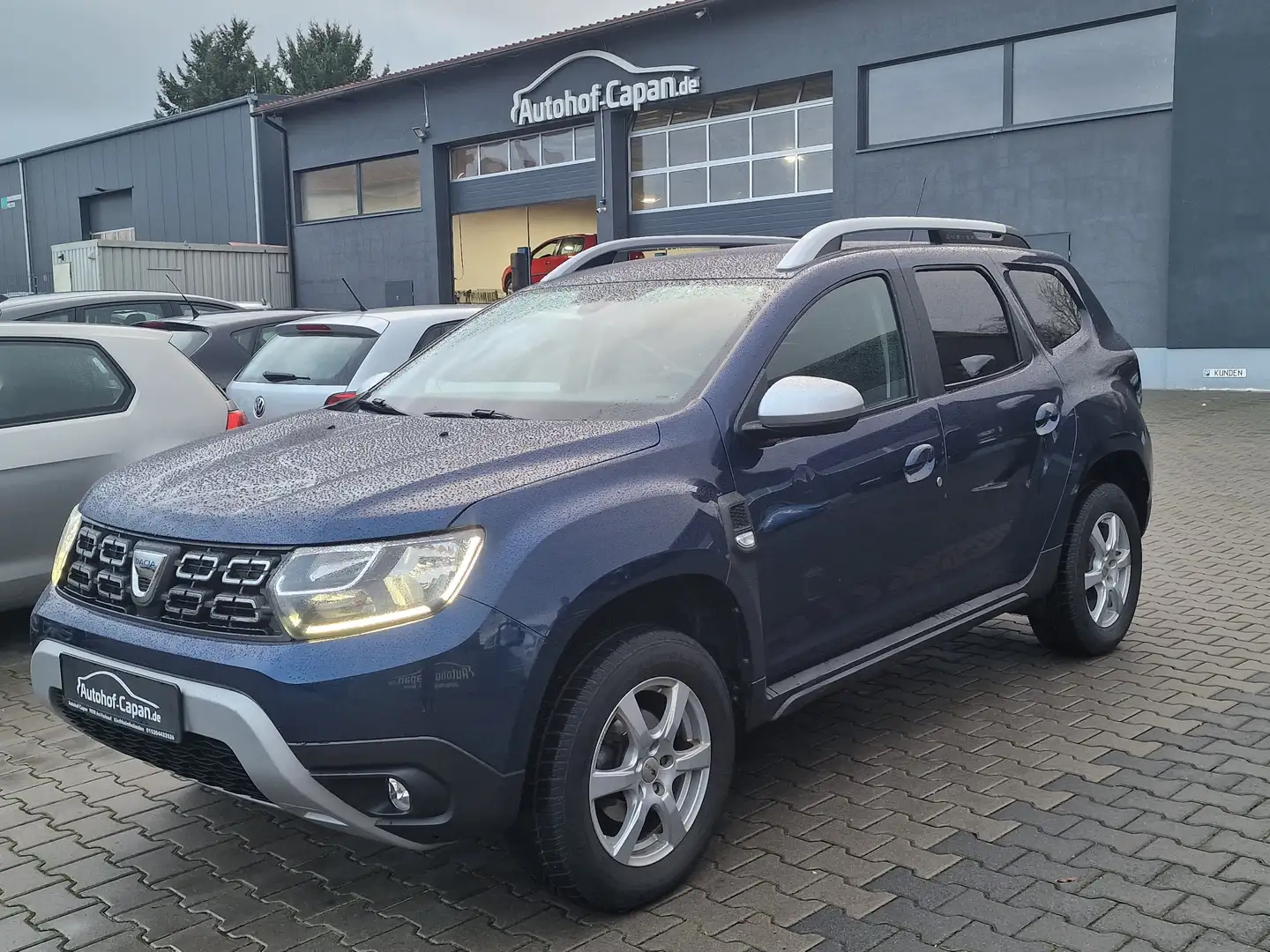 Dacia Duster Duster SCe 115 2WD/AHK/Sitzh./Navi/Kamera/Alus/ZV/ - 1