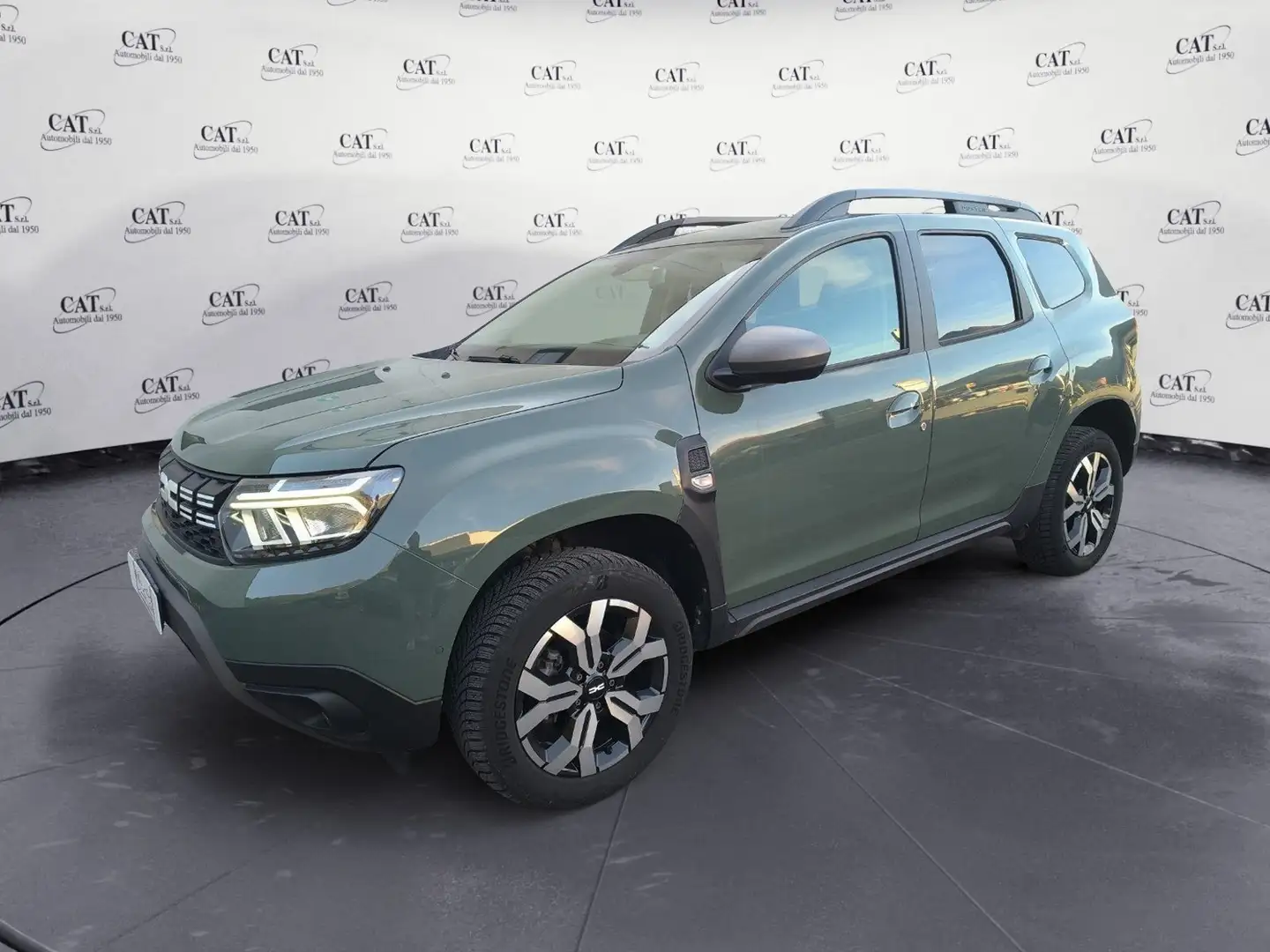 Dacia Duster Duster 1.5 Blue dCi 115 CV 4x4 Journey Groen - 1