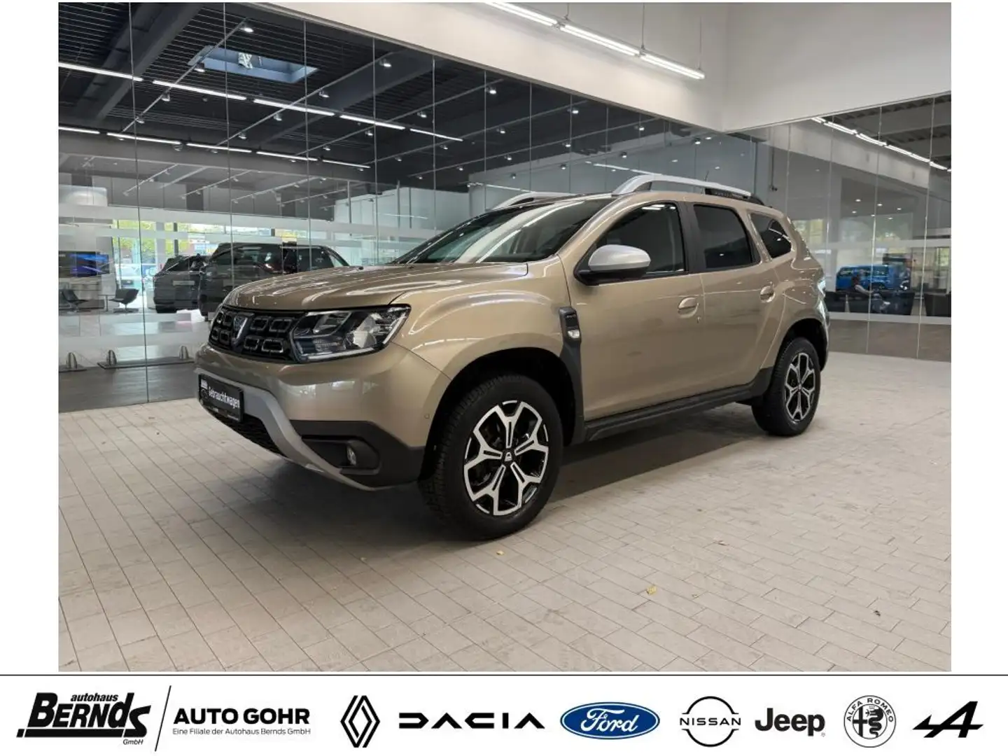 Dacia Duster TCe 125 4WD Comfort R-KAM NAVI SHZ GJR AHK KLIMA Beige - 1