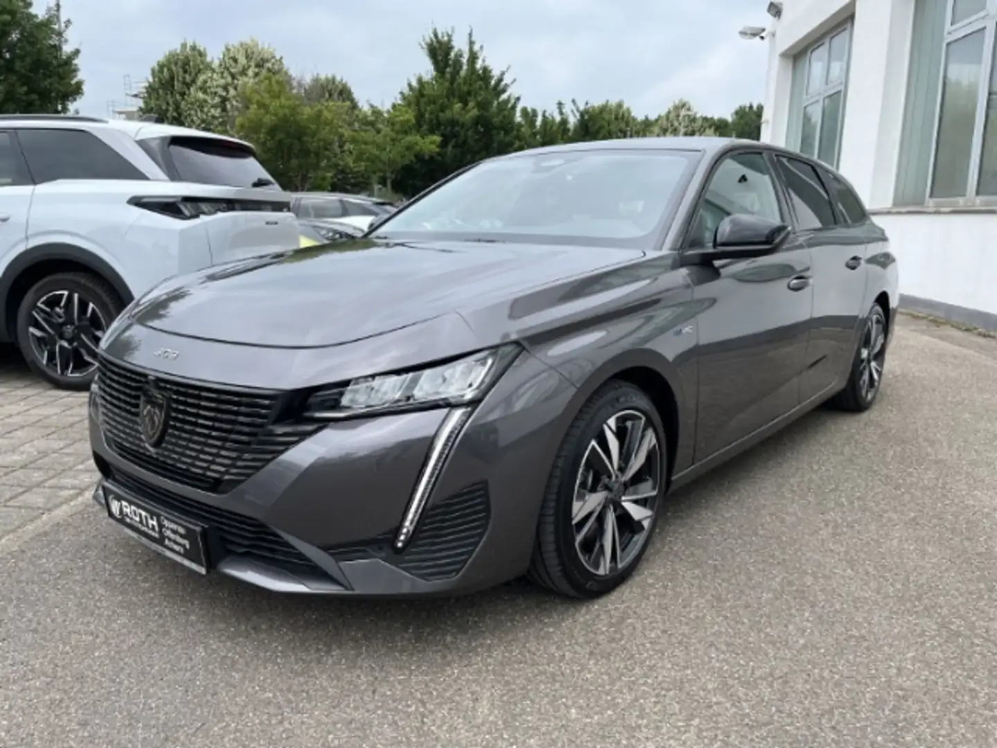 Peugeot 308 Plug-In Hybrid 180 e-EAT8 SW Allure Navi Klima Kam Grijs - 1