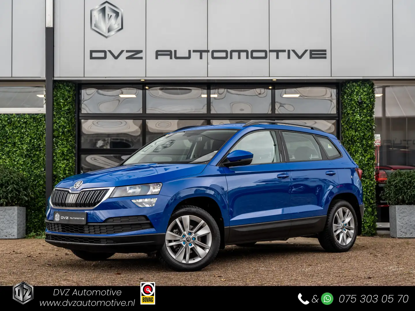 Skoda Karoq 1.0 TSI Ambition | PDC | Trekhaak | LMV Azul - 1