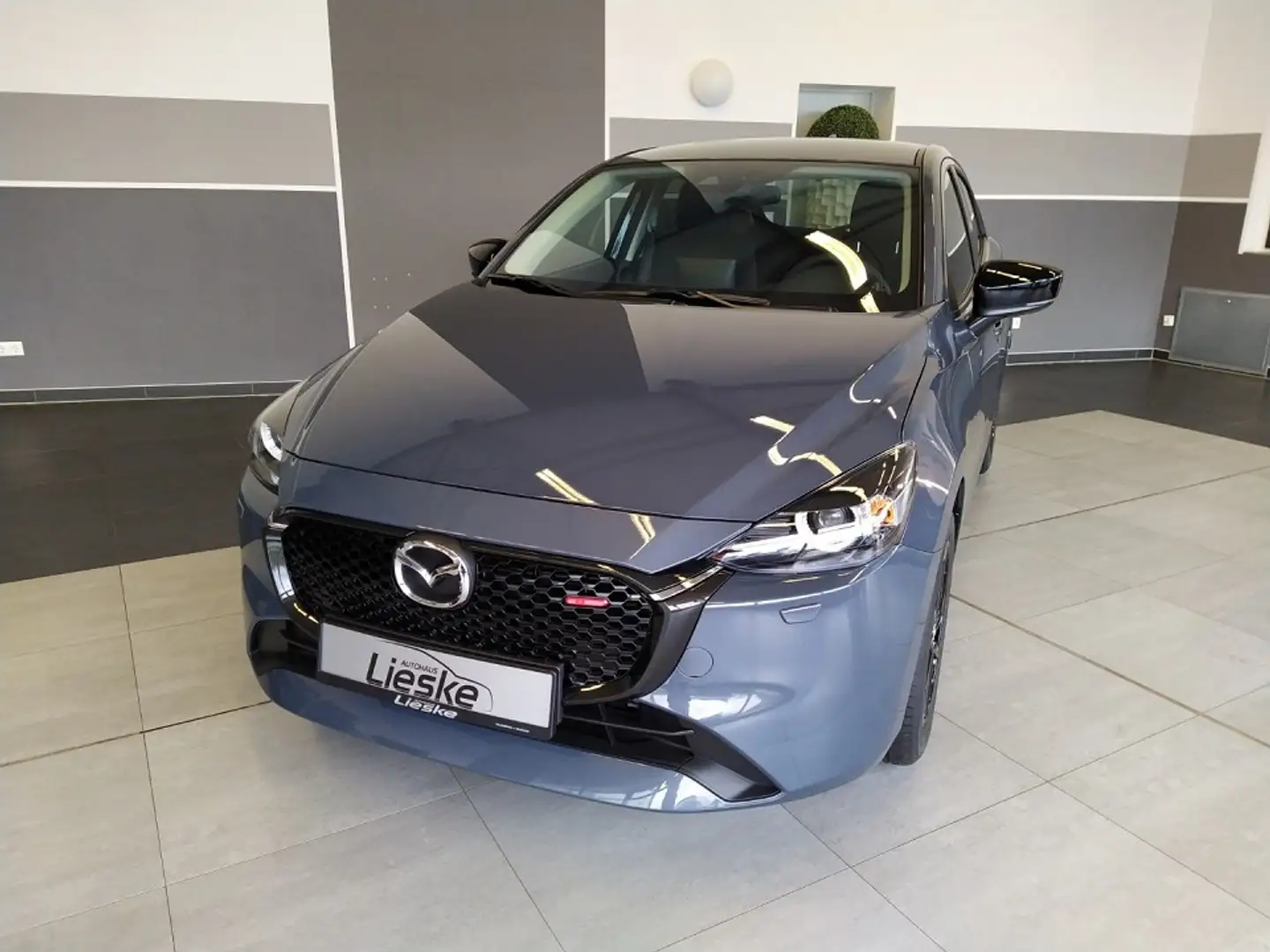 Mazda 2 2023 5HB 1.5L SKYACTIV-G 90ps 6AT FWD HOMURA Grau - 1