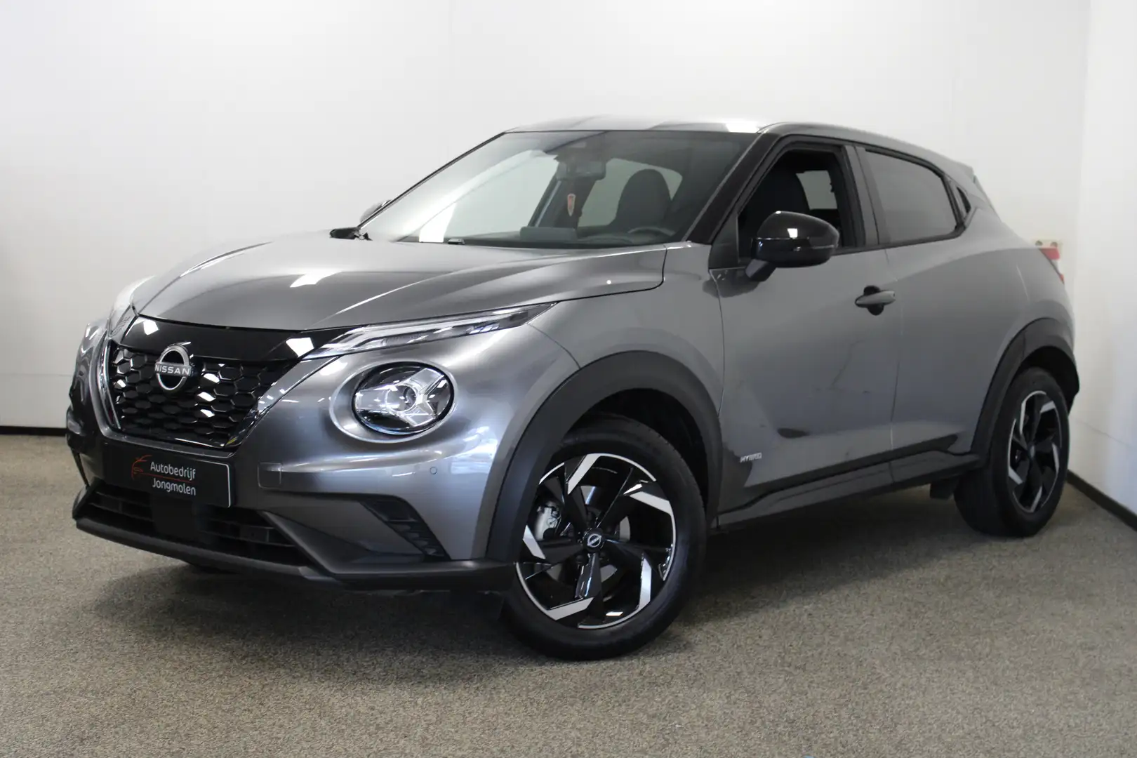 Nissan Juke 1.6 Hybrid Business Premium Grijs - 1