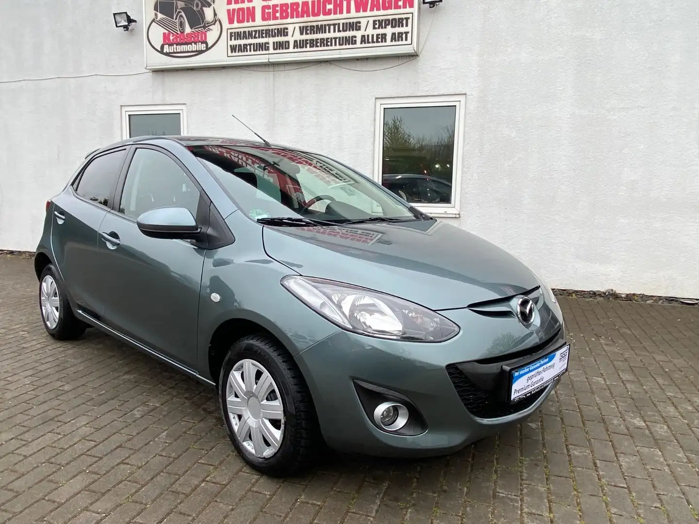 Mazda 2 Lim. 1.3 Edition 40 Jahre Klima Navi Sitzh.AUX Grey - 1