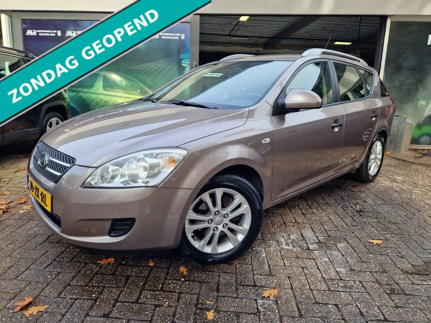 Kia Ceed / cee'd Sporty Wagon 1.4 X-tra | 12MND GARANTIE | AIRCO | Beige - 1