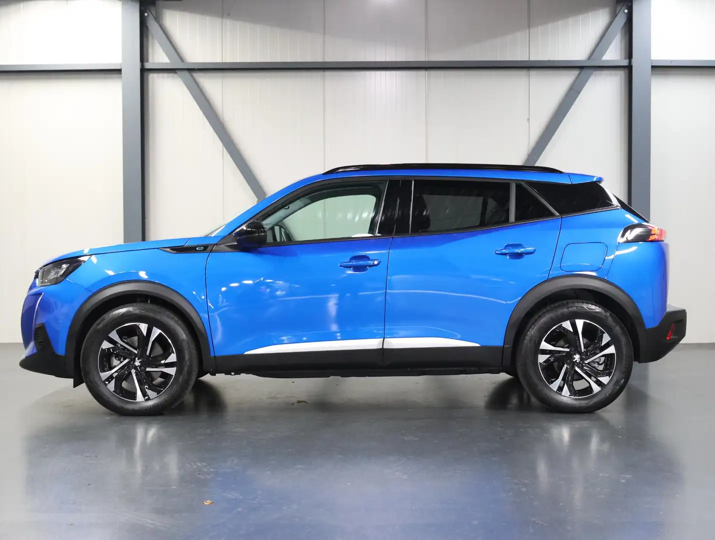 Peugeot e-2008 EV Allure Pack 50 kWh 136PK | Accurapport 94,6% | Bleu - 2