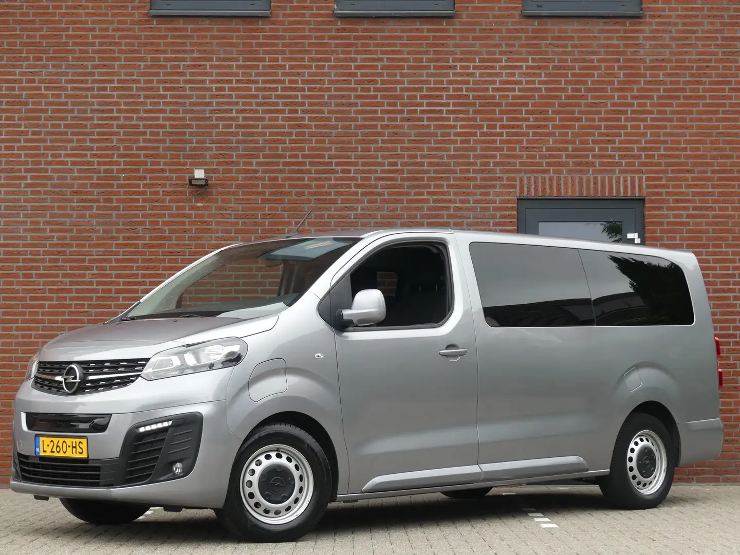 Opel Vivaro-e Combi L2 75 kWh 9 Persoons Pano/PDC/Airco/Cruise c Grijs - 1