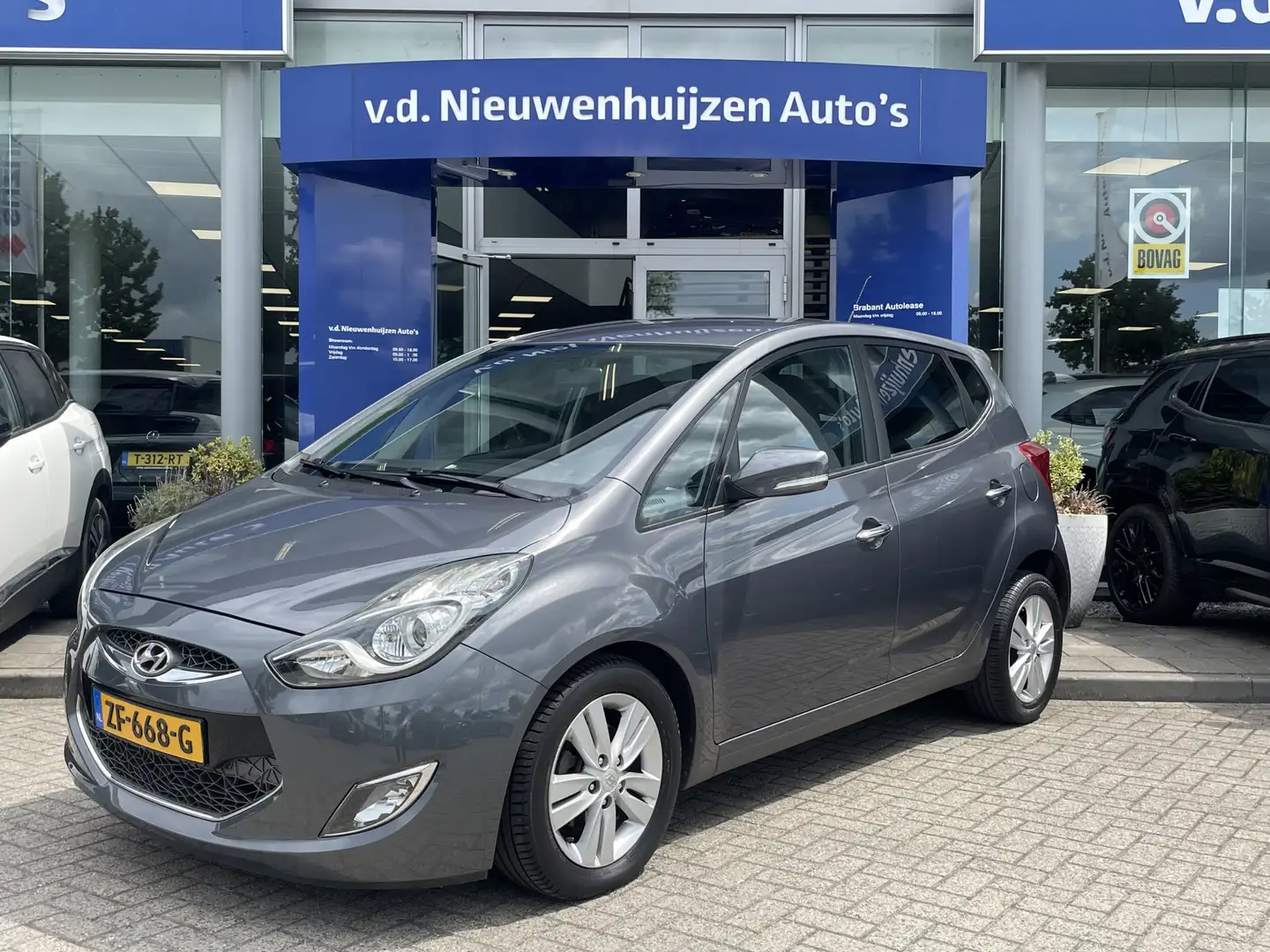 Hyundai iX20 1.6i i-Vision AUTOMAAT Climat Airco Cruise c.    f Grijs - 1
