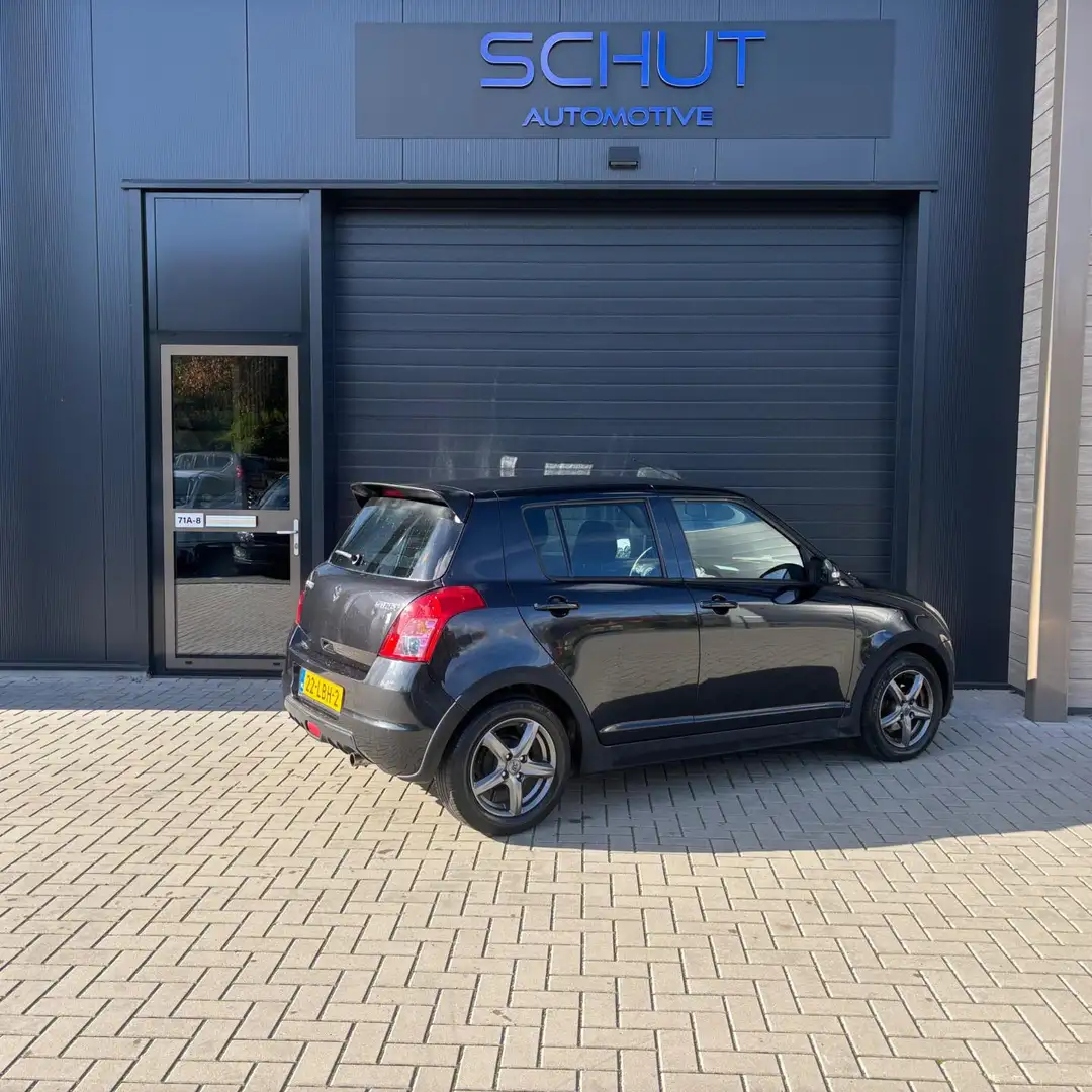 Suzuki Swift 1.3 SPORT 5DRS AIRCO | STOELVERWARMING | APK 2026 Zwart - 2