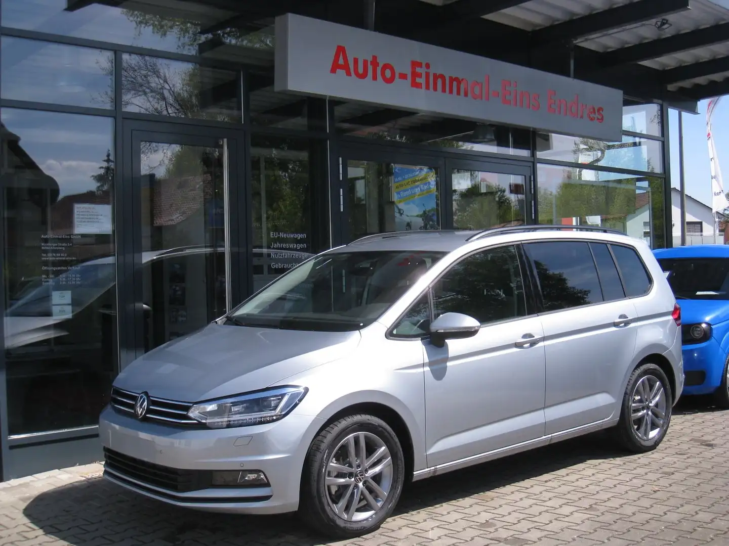 Volkswagen Touran 1.5 TSI DSG  - COMFORT *7-Sitzer*Kamera*NAVI*el.HK Plateado - 1