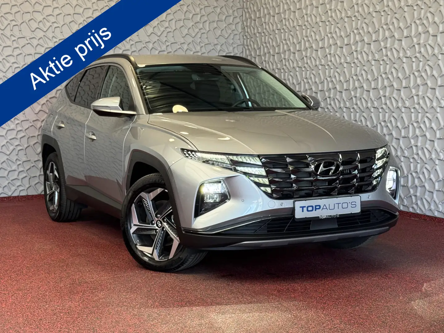 Hyundai TUCSON 1.6 T-GDI PHEV 265PK 19''LMV 4WD LED STUUR/STOEL V Grijs - 1