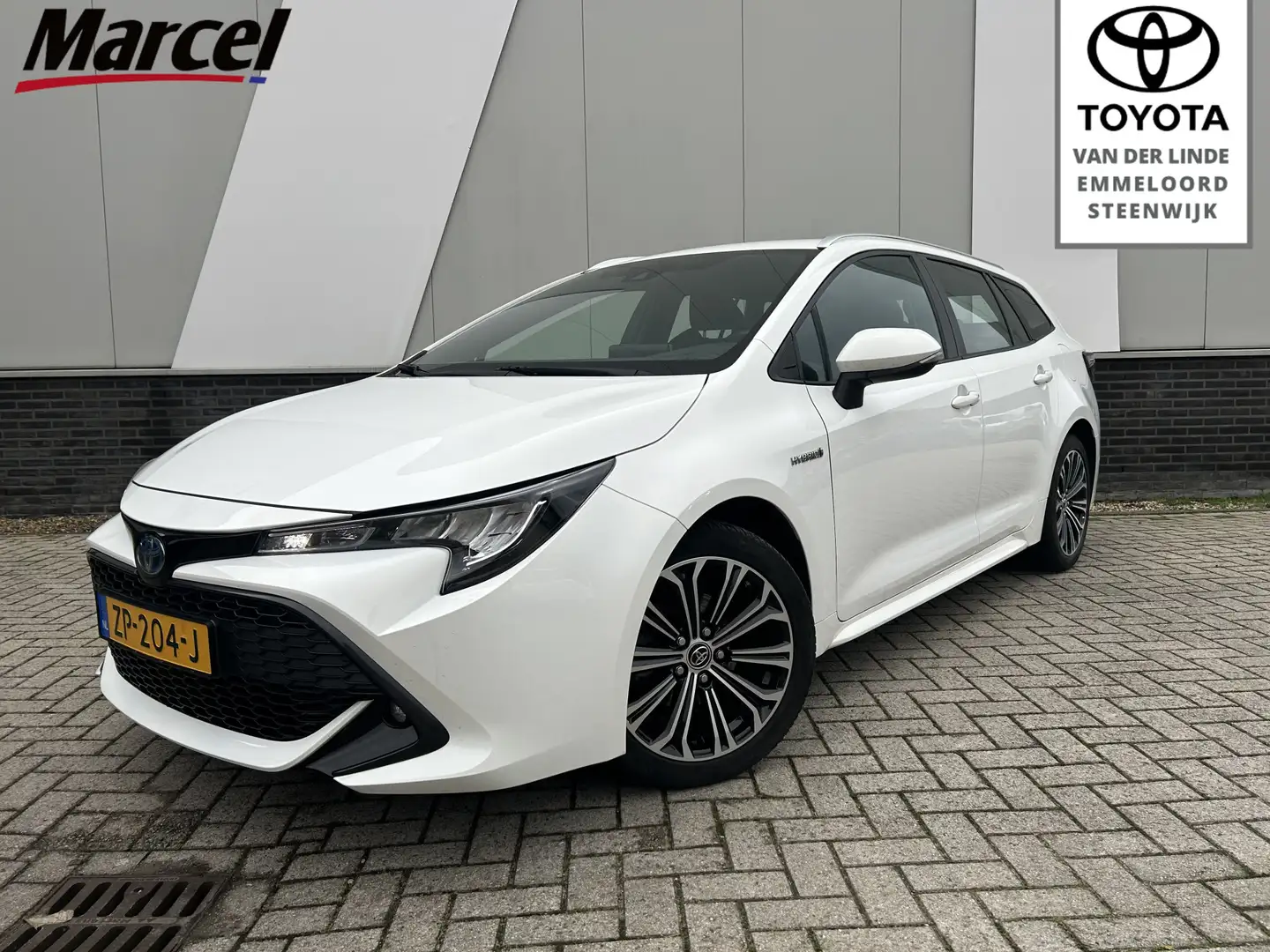 Toyota Corolla Touring Sports 1.8 Hybrid First Edition 1e eign. Wit - 1