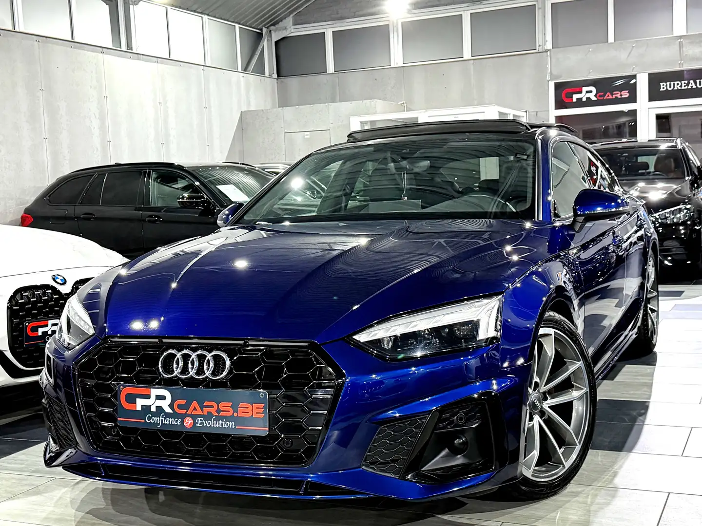 Audi A5 35 TDi SportBack S Line Shadow Look 1e Main Bleu - 1
