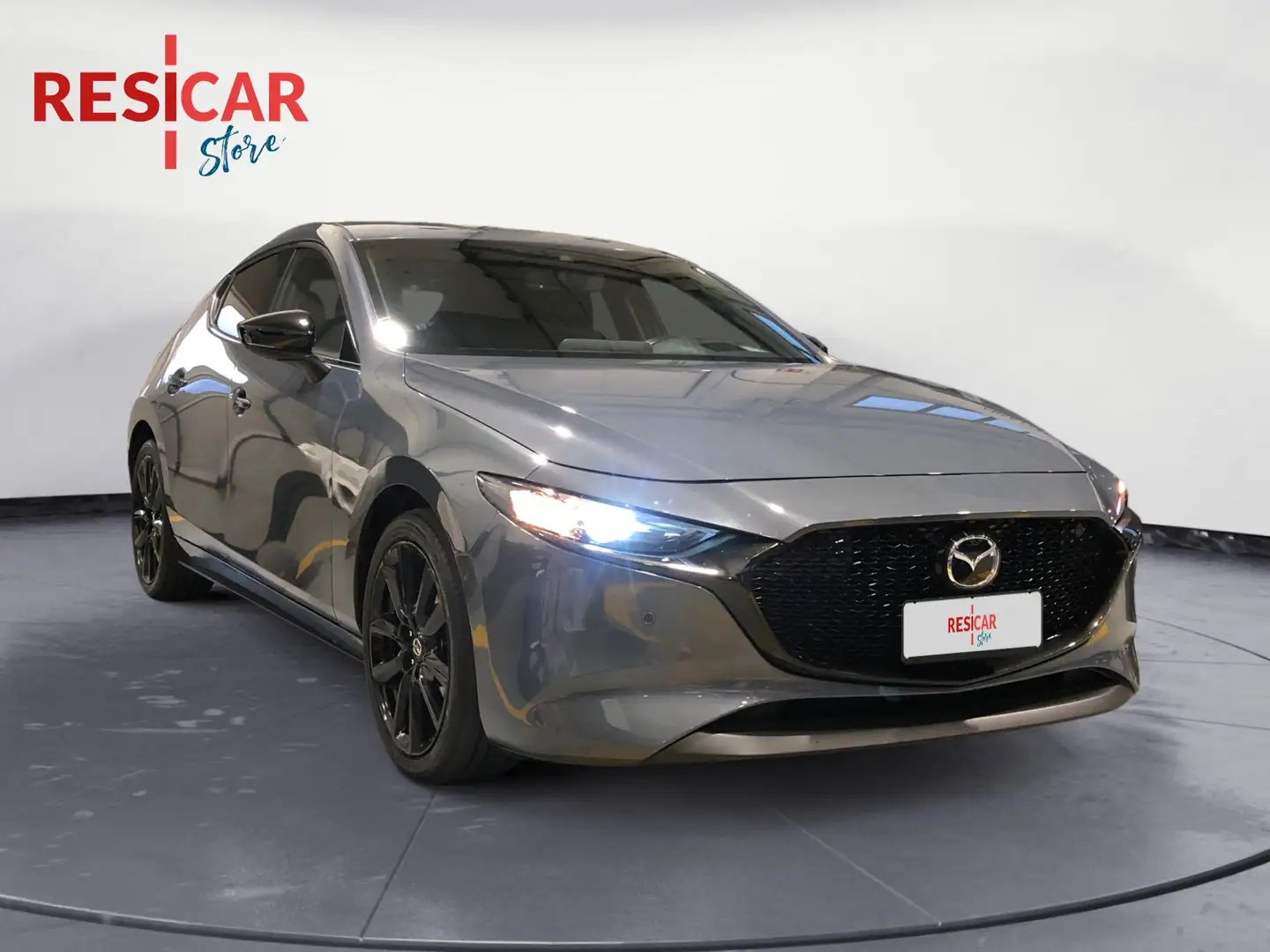 Mazda 3 5 Porte 2.0 Skyactiv-G M Hybrid Homura Gris - 1