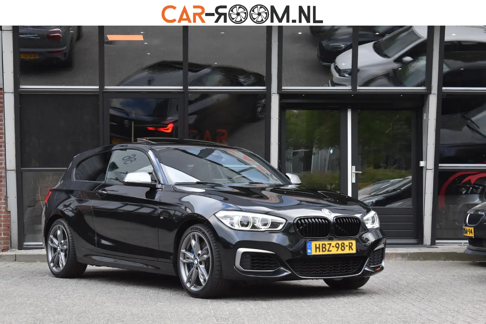 BMW 140 1-serie M140i xDrive High Executive Pano Camera H/ Nero - 1