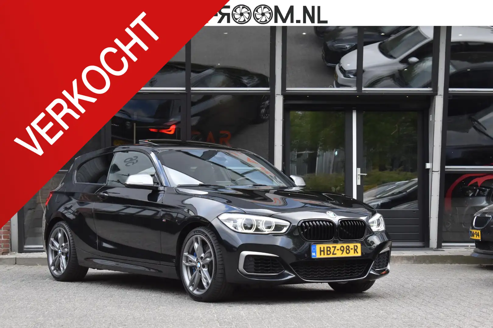 BMW 140 1-serie M140i xDrive High Executive Pano Camera H/ Zwart - 1