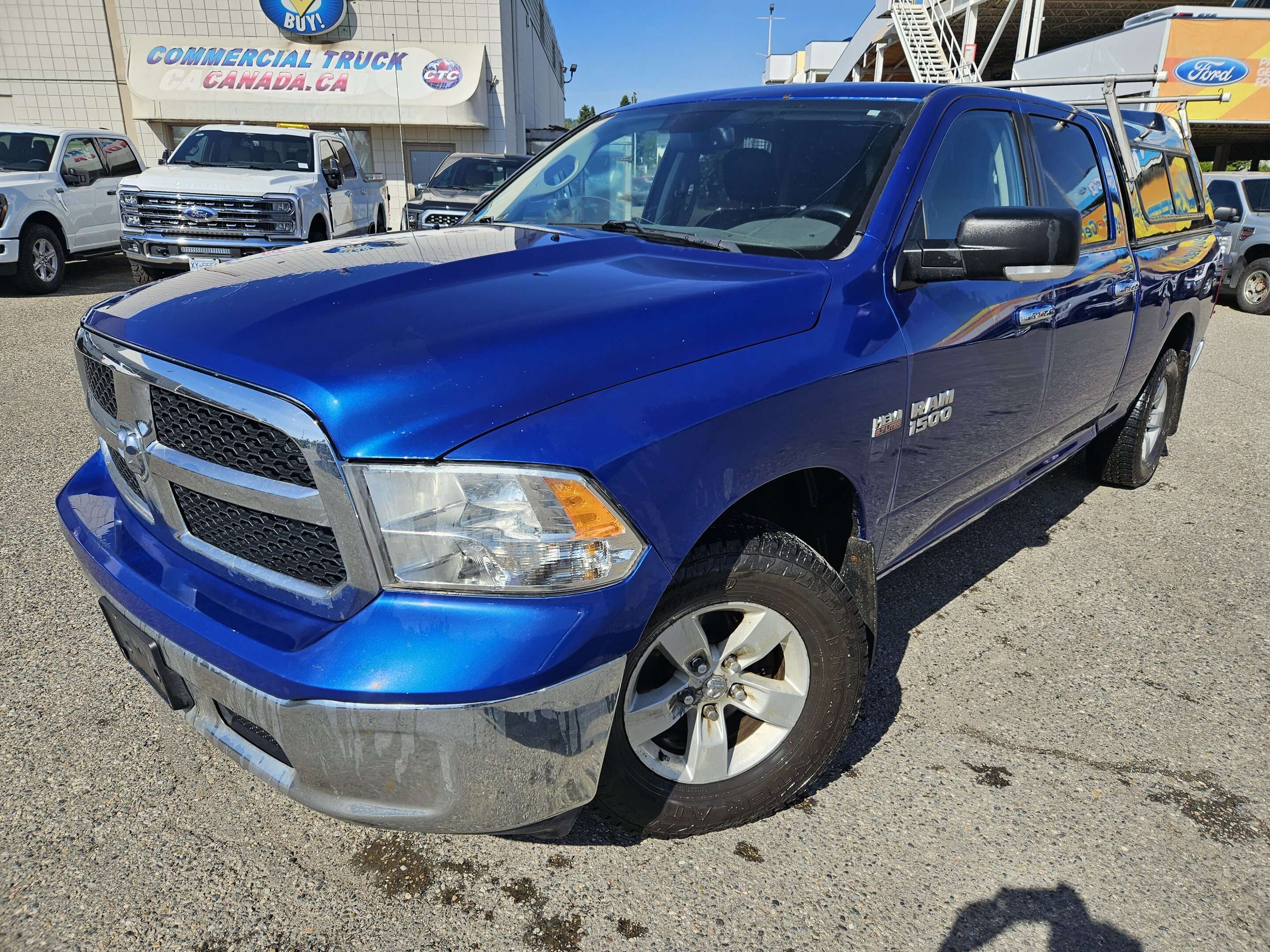 Blue 2016 RAM 1500 Pickup Truck Four-Wheel Drive 8-Speed Automatic
