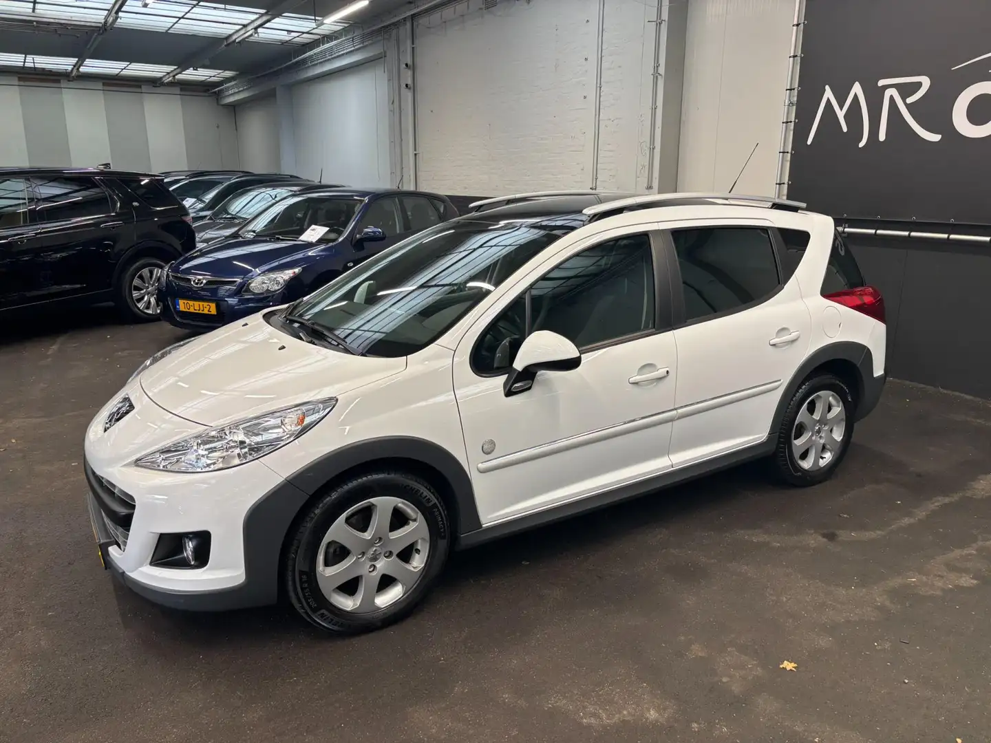 Peugeot 207 SW Outdoor 1.6 VTi airco eerste eigenaar 59000km Weiß - 2
