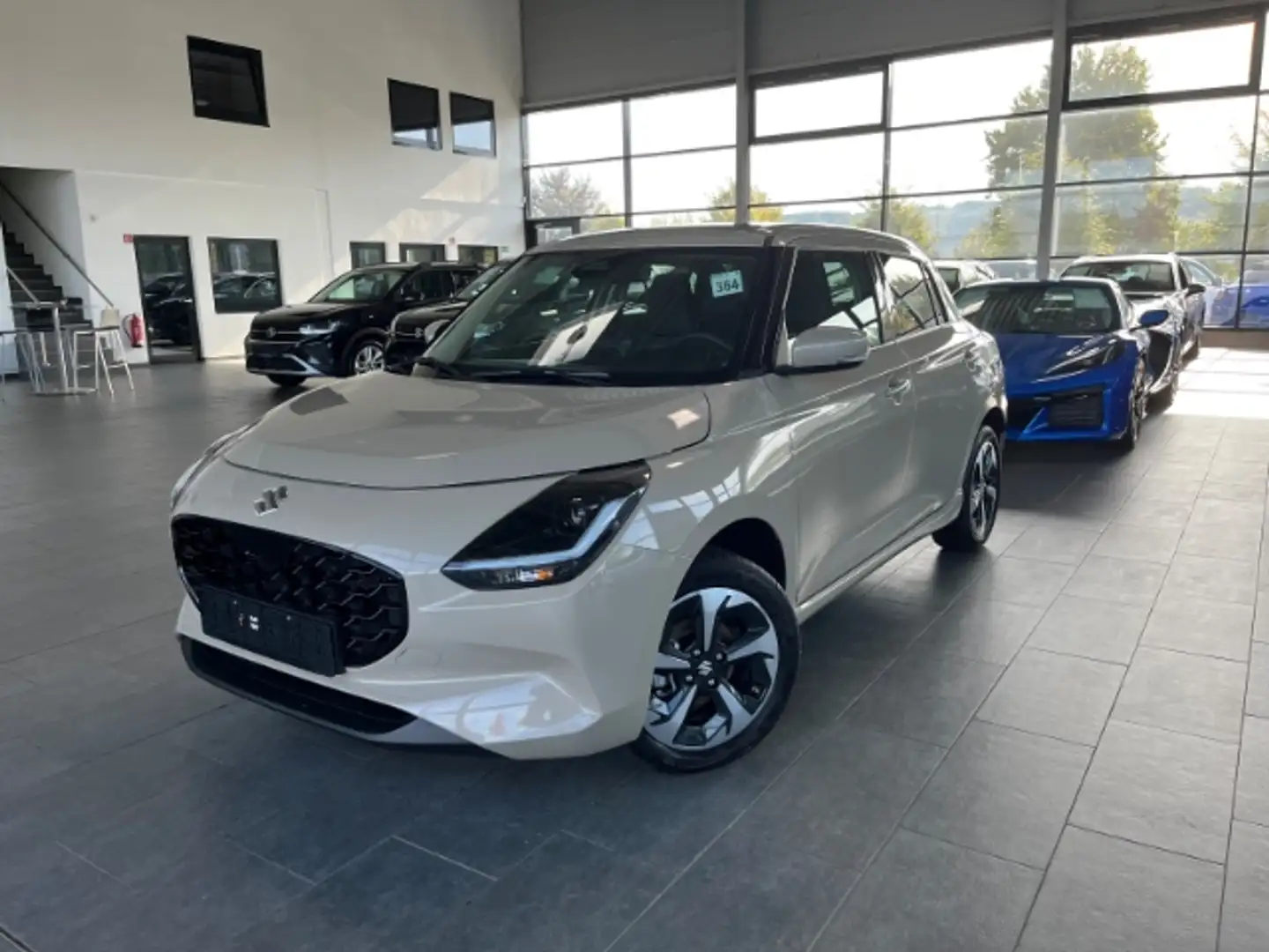 Suzuki Swift 1.2 Comfort + ALLGrip Navi LED Kamera ACC SitzHZG Beige - 1